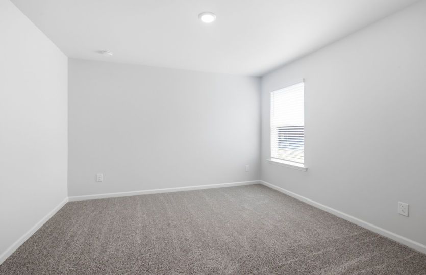 Hampton #105 - Guest Bedroom on First Floor