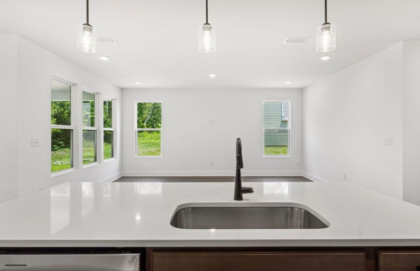 Large Kitchen Island Overlooking Gathering Room