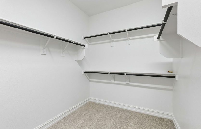 Walk-in closet in primary suite