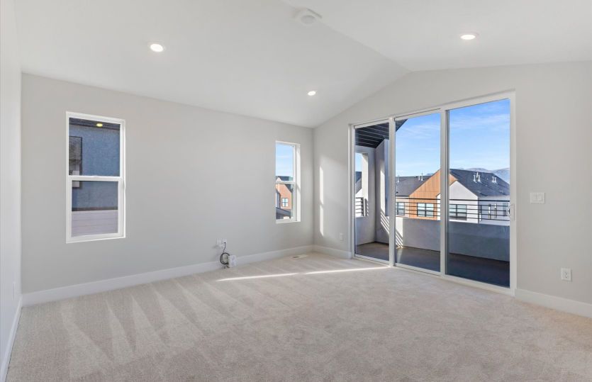 Spacious Owner's Suite with Vaulted Ceilings