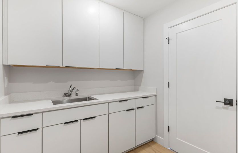 Laundry Room with Sink and Plenty of Storage