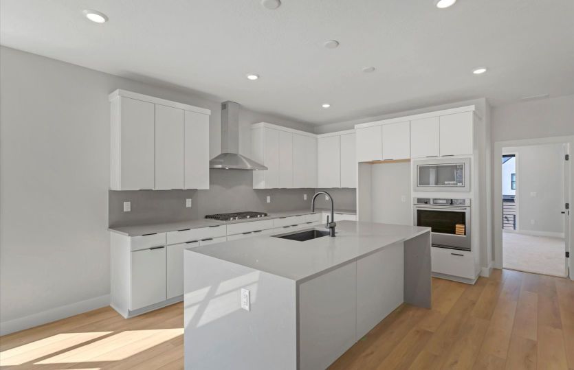 Chef Kitchen with Waterfall Edge Island