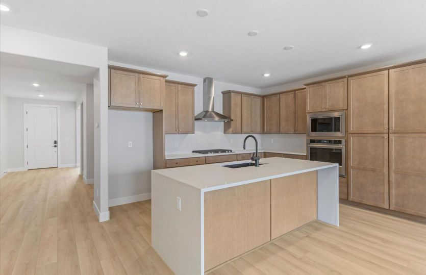 Chef Kitchen with Waterfall Edge Island