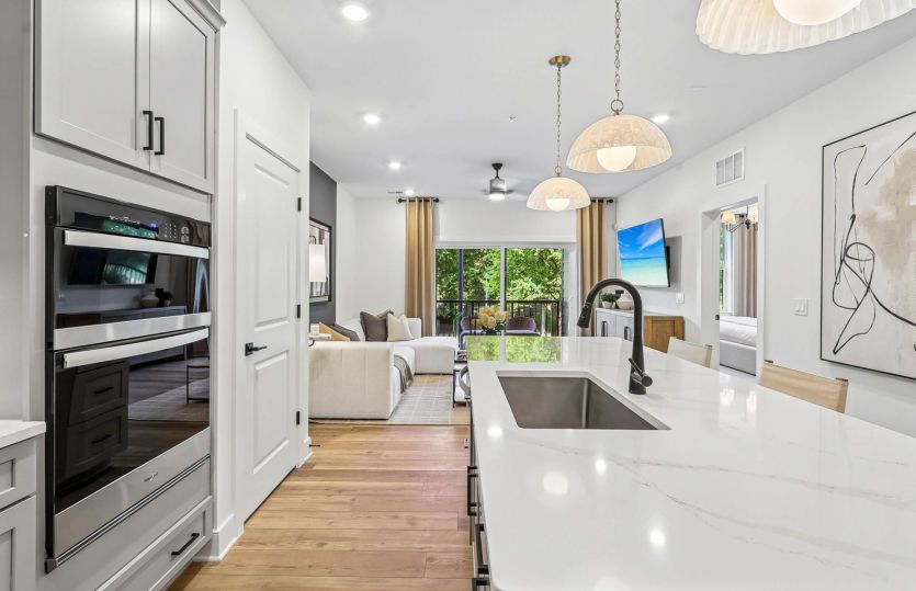 Gourmet Kitchen Opens to the Gathering Room - Model Representation