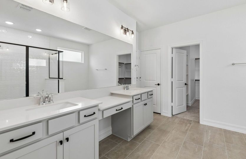 Double vanity in owners bath
