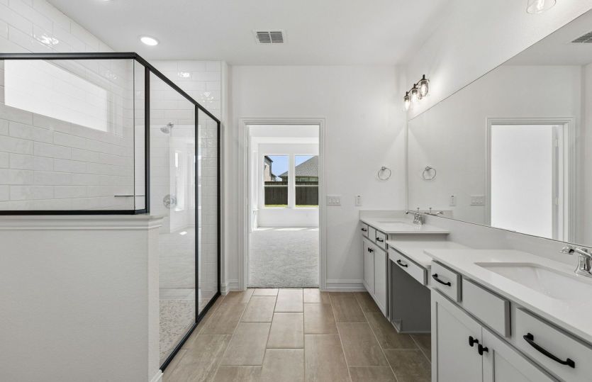 Separate tub and shower in owners bath