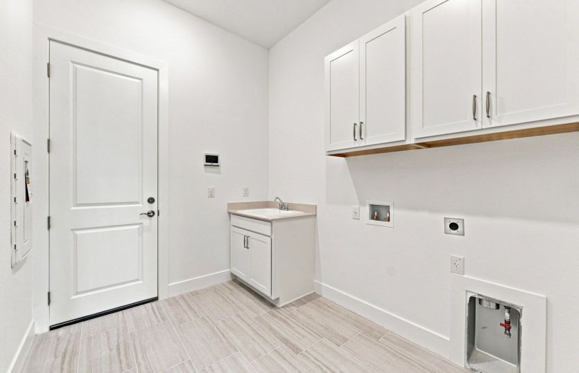 Laundry Room w/Built-in Cabinets