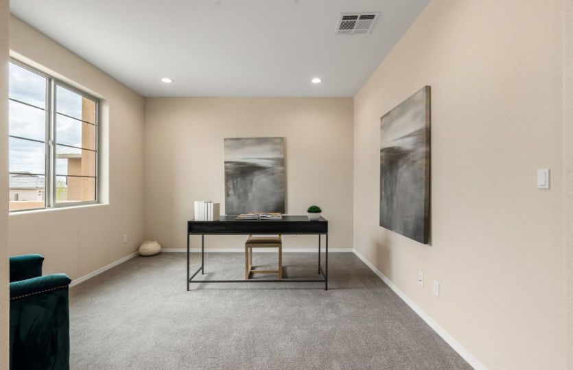 Oversized window provides ample lighting for this flexible space