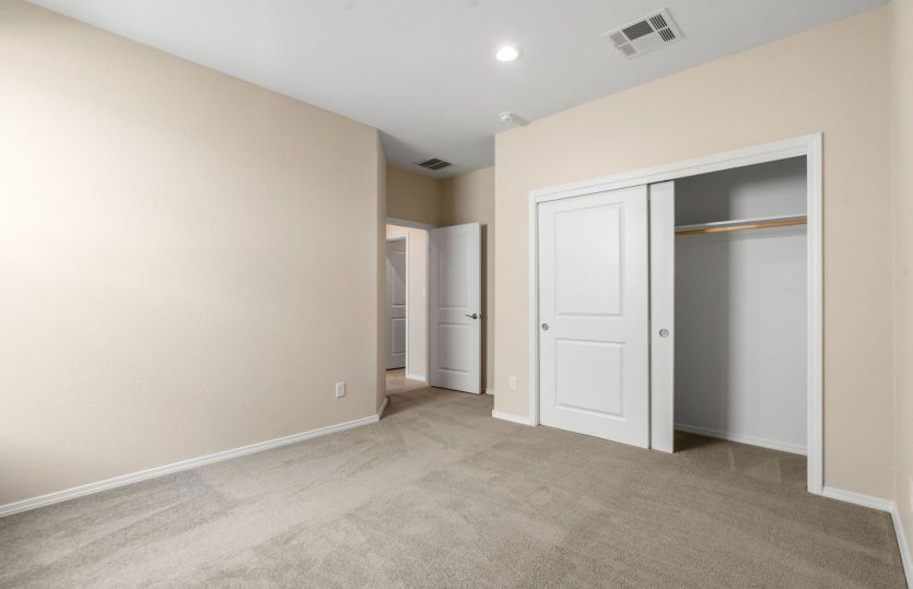 Fourth bedroom with generous closet space