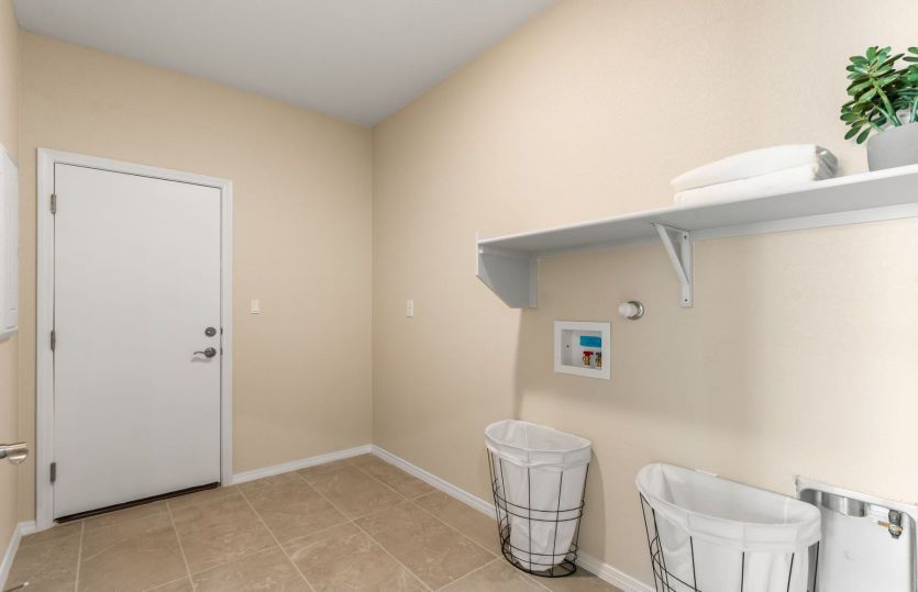 Functional laundry room with built-in storage