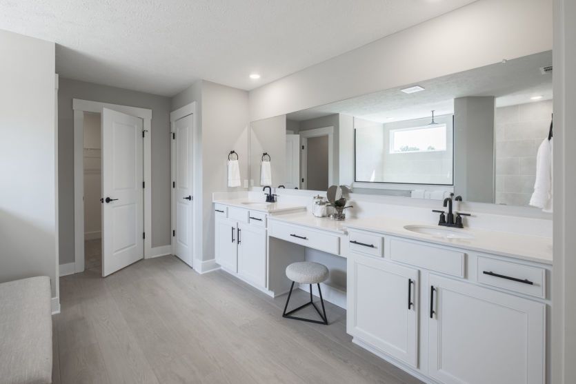 Large Owner's Bath with Two Vanities and Separate Tub/Shower