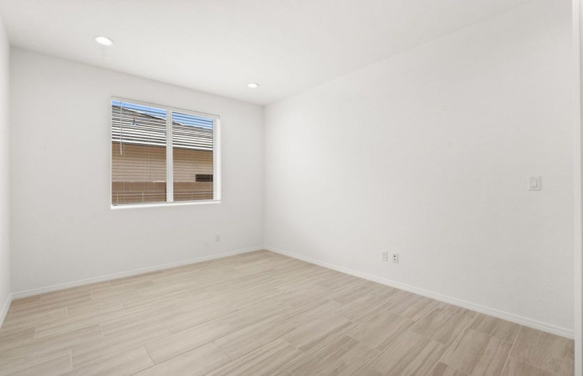 The den provides the perfect place for a home office or workspace