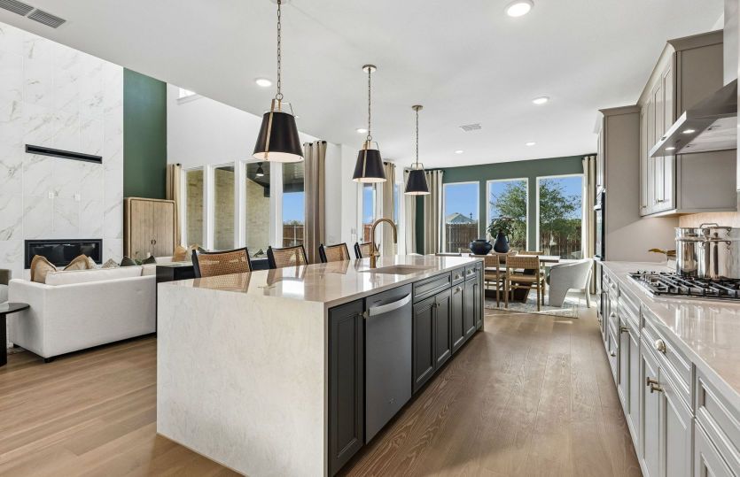 Beautiful pendent lighting in kitchen *model representation
