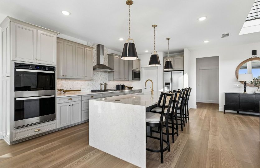 Abundant cabinet space available in kitchen *model representation
