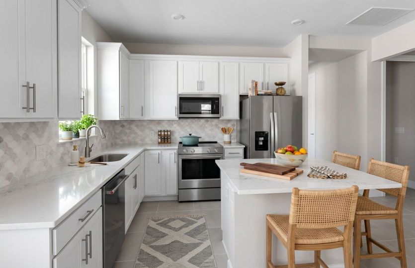Kitchen featuring stainless steel appliances | Virtually staged
