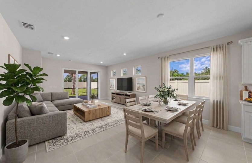 Enjoy natural lighting in the gathering room | Virtually staged
