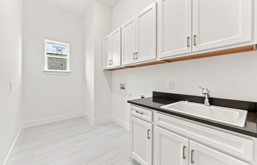 Laundry Room w/Built-in Cabinets