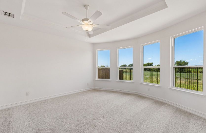 Primary suite with bay windows