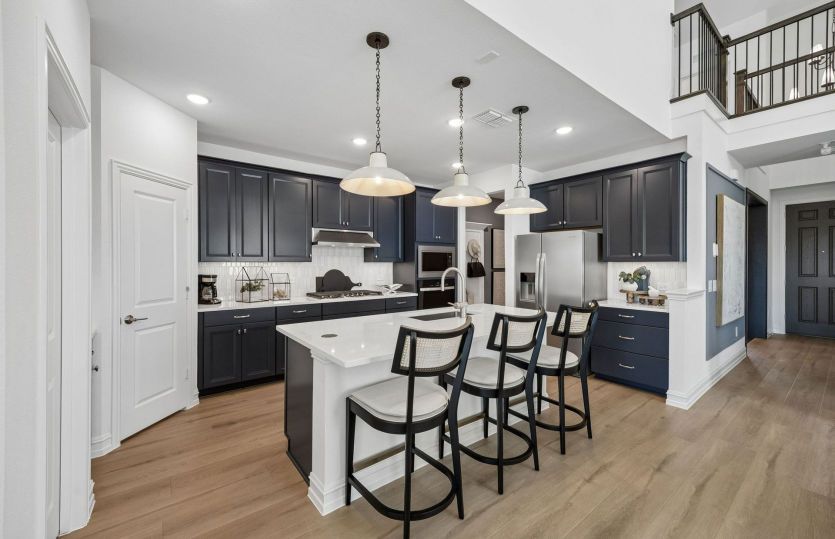 Beautiful pendent lighting shown in kitchen