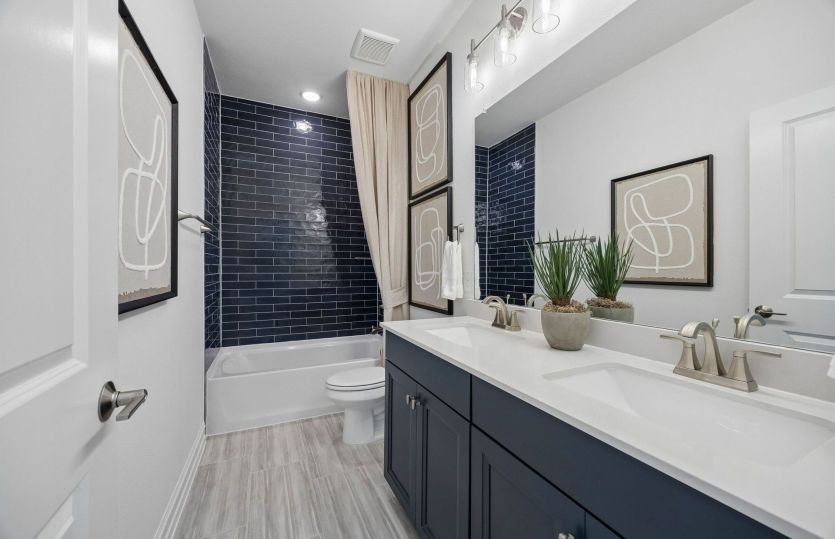 Secondary bath with double vanity shown