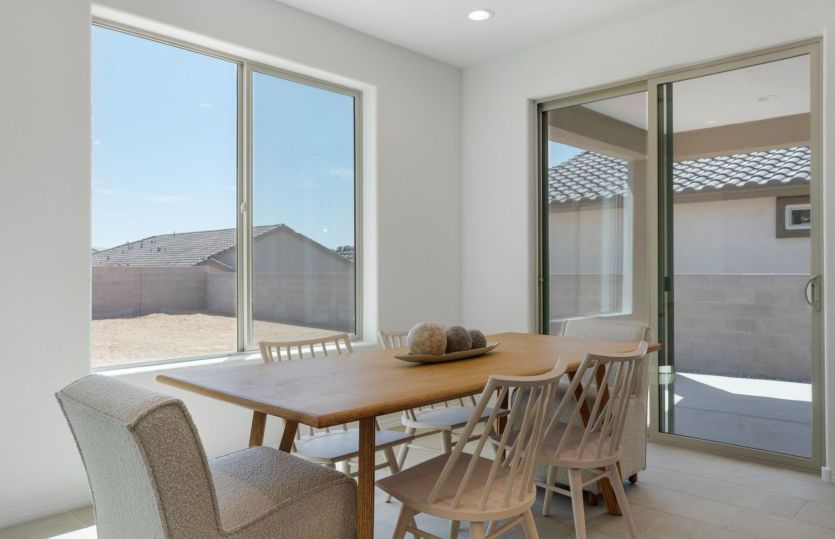 Dining room with sliding door access to covered patio
