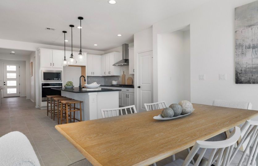 Kitchen flows seamlessly into dining for effortless entertaining