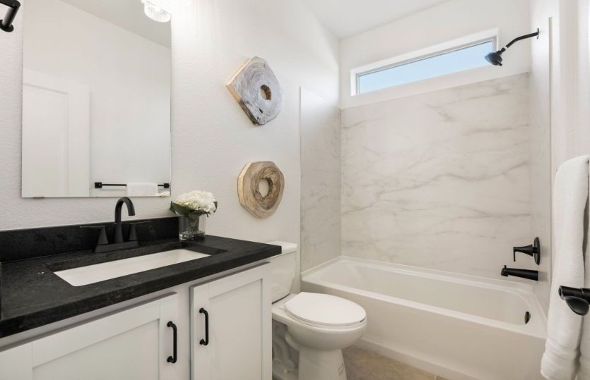 Secondary bathroom with tub/shower combo