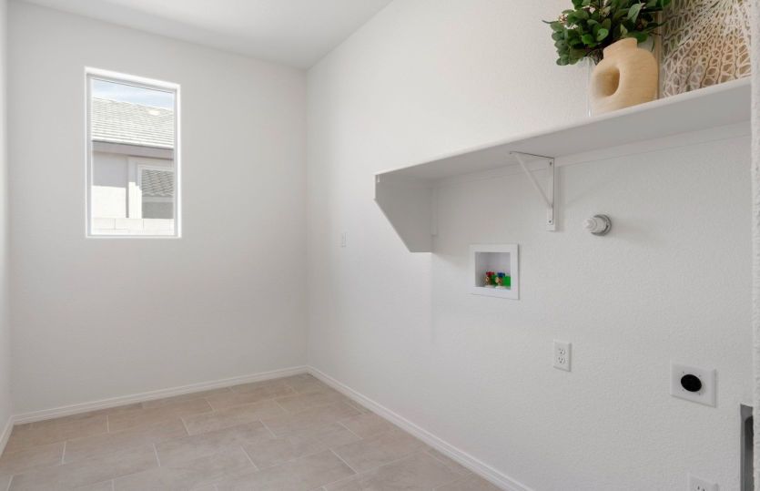 Laundry room with build in shelving for added function