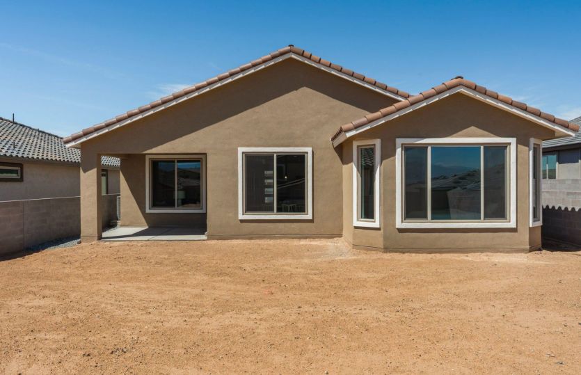 Large backyard with covered patio for effortless outdoor entertaining