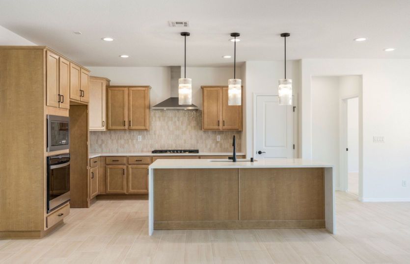 Kitchen features abundant cabinet space for organization
