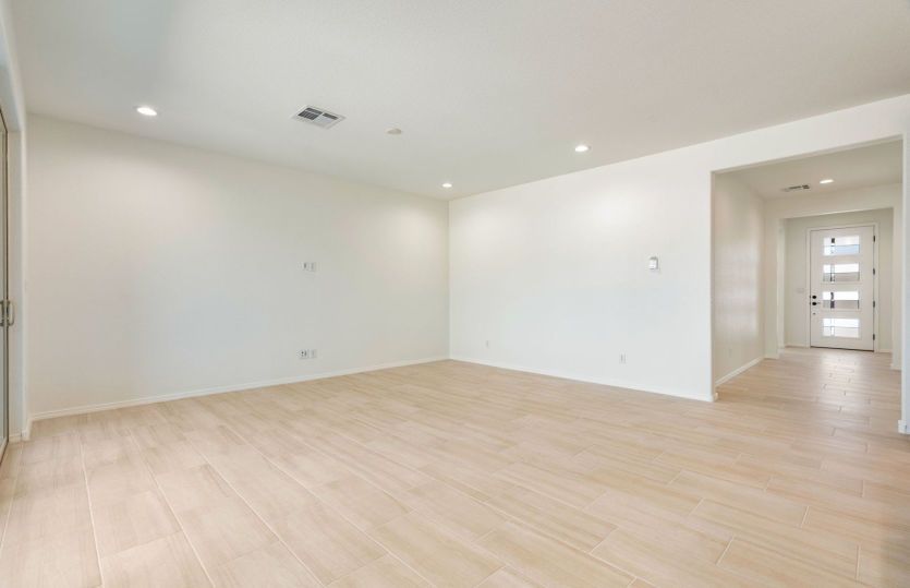 Open living room ideal for hosting movie night or game day