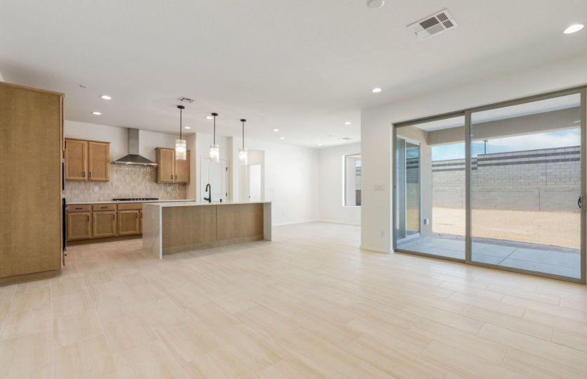 Open living space features seamless flow between kitchen, living, and dining area