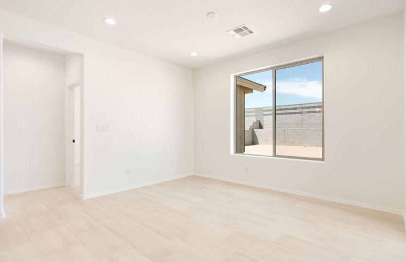 Dining area featuring oversized window for abundant natural light