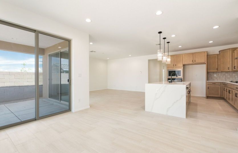Dining area with sliding door access to covered back patio