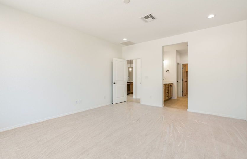 Spacious owner's suite designed for rest and relaxation