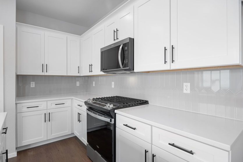 Kitchen with Tiled Backsplash