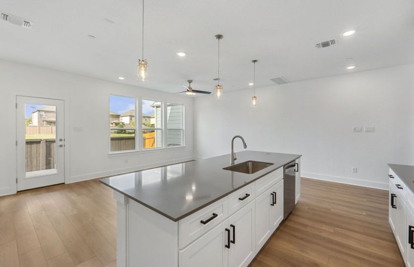 Representative Photo- Kitchen Open to the Gathering Space