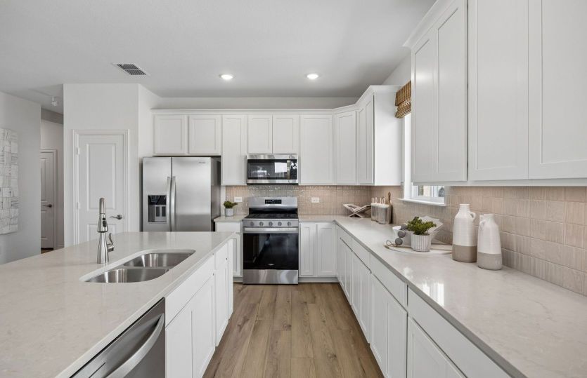 Abundant cabinet space available in kitchen