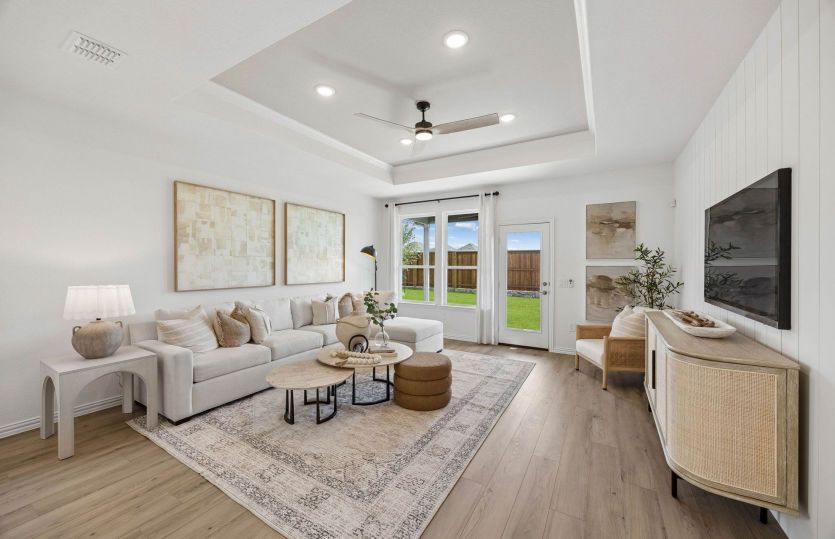 Spacious living room with optional tray ceiling