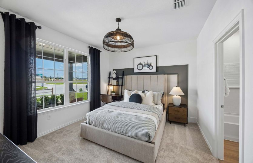 Secondary bedroom with large windows