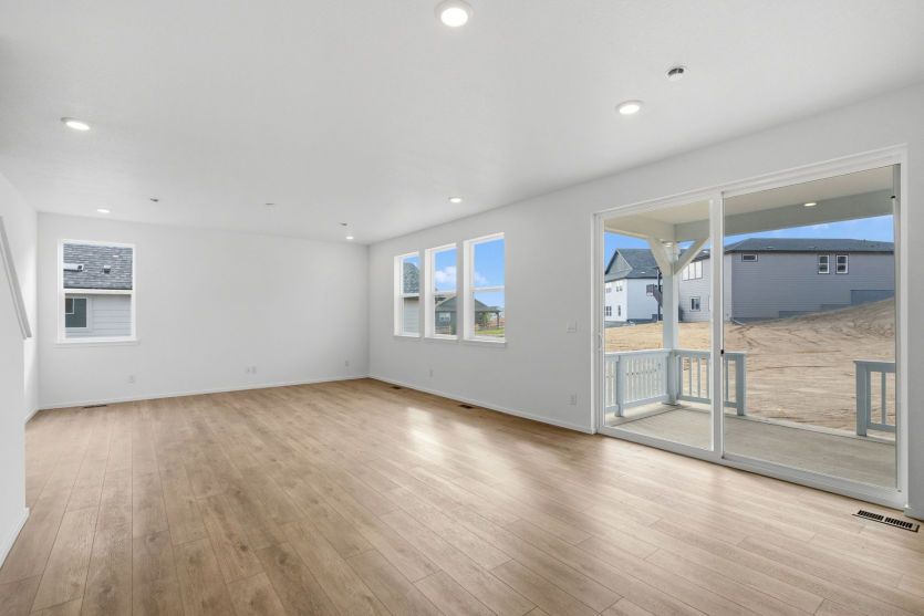 Dining Area with Sliding Glass Door to Covered Patio
