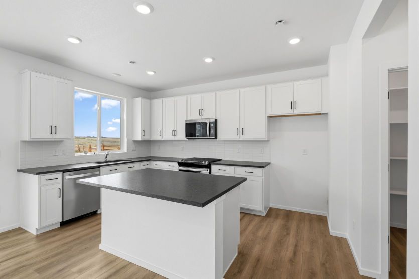 Kitchen with Tiled Backsplash