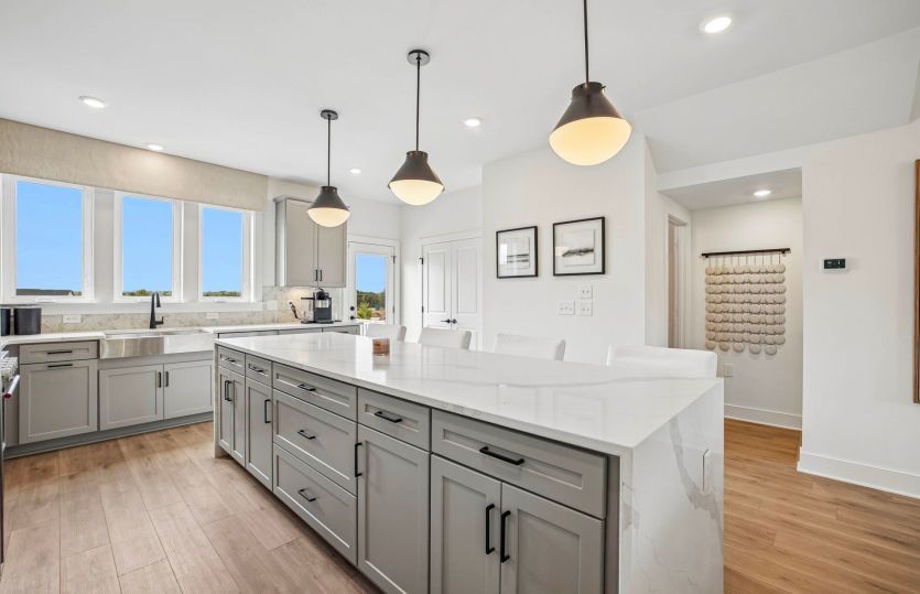 Rear Kitchen Opens to the Balcony