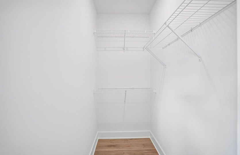 One of Two Walk-In Closets in the Primary Suite