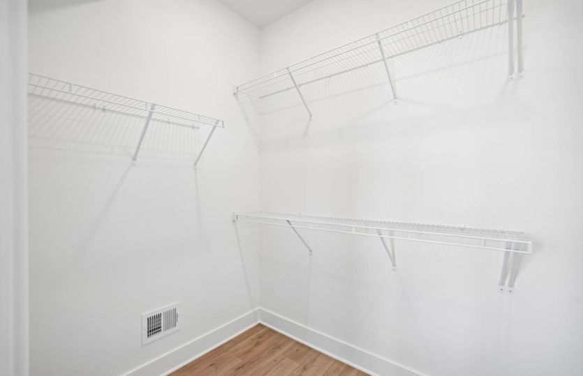 One of Two Walk-In Closets in the Primary Suite