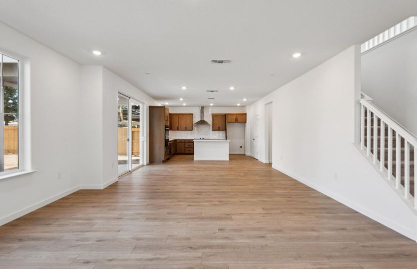 Gathering room open to cafe and kitchen