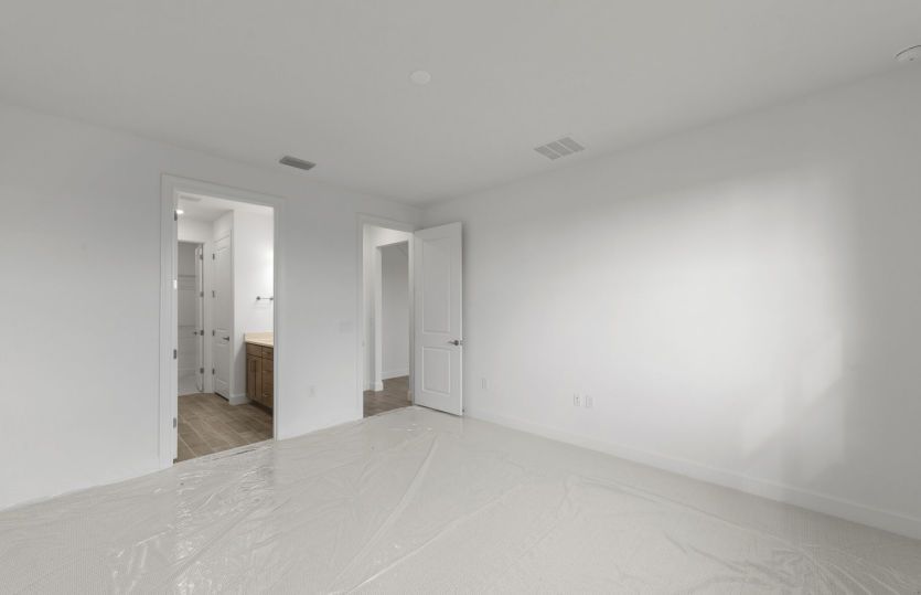 Enjoy a quiet retreat in this ideal owner's suite