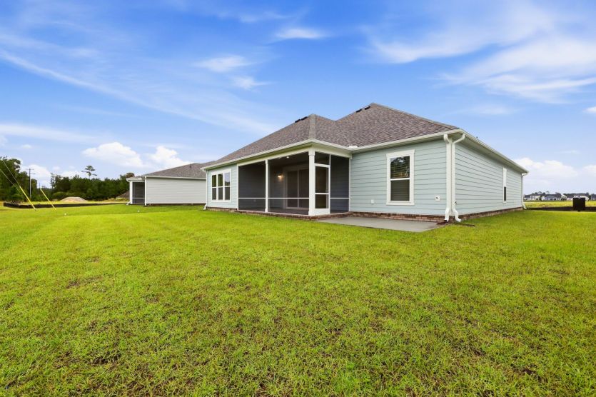 Open backyard with room to relax, play, or make it your own.
