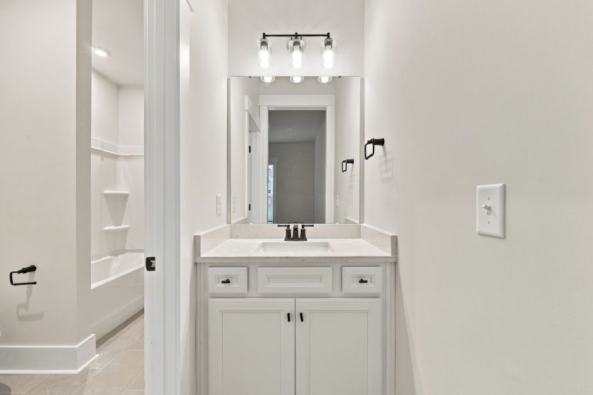 Well-appointed secondary bathroom with contemporary fixtures.