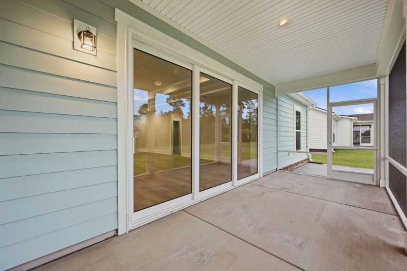 Screened porch extends the living space for comfortable outdoor enjoyment.